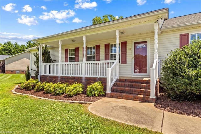 189 Lochshire Ln, Woodleaf, NC 27054 - view of front of house featuring a porch and a front yard