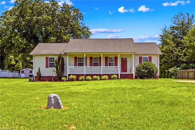 189 Lochshire Ln, Woodleaf, NC 27054 - view of front facade with a porch, a storage unit, and roof with shingles