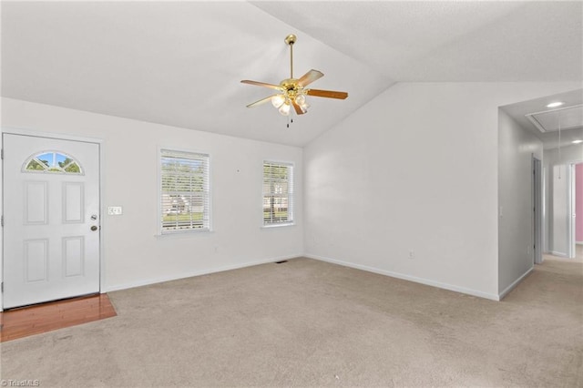 189 Lochshire Ln, Woodleaf, NC 27054 - foyer entrance featuring carpet, a ceiling fan, and vaulted ceiling