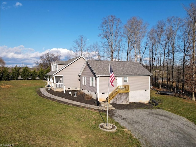 view of side of property featuring a yard