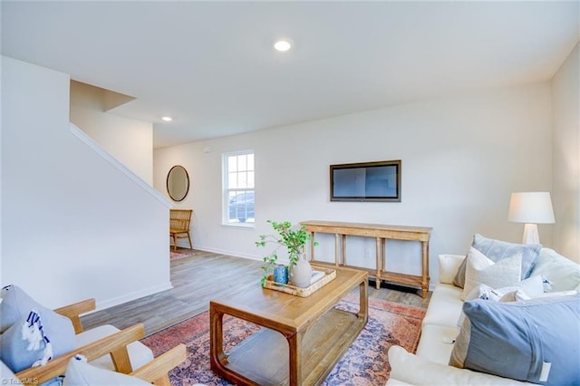 living room with light hardwood / wood-style flooring