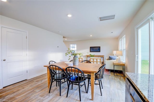 dining room featuring light hardwood / wood-style floors