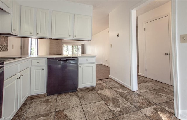 kitchen featuring white cabinetry, black dishwasher, and kitchen peninsula