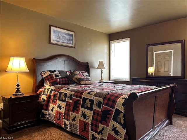 bedroom featuring carpet