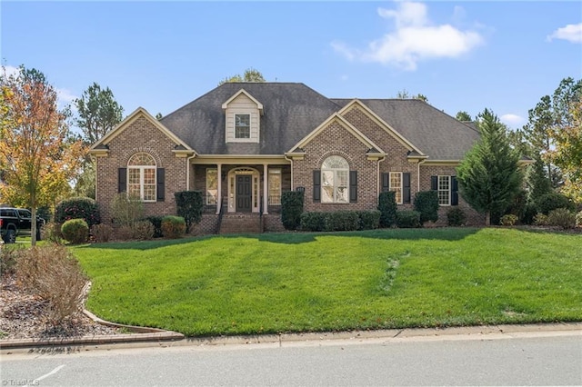 view of front of home featuring a front lawn