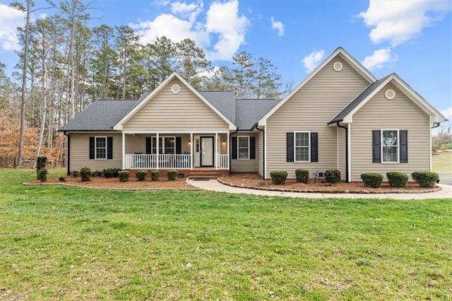 ranch-style home with a front lawn and a porch