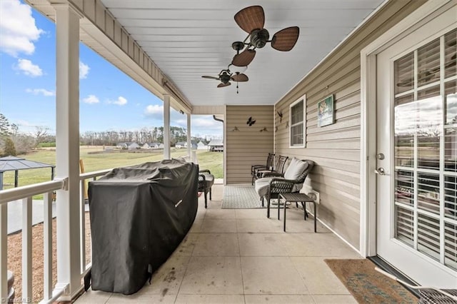 view of patio with a ceiling fan and area for grilling