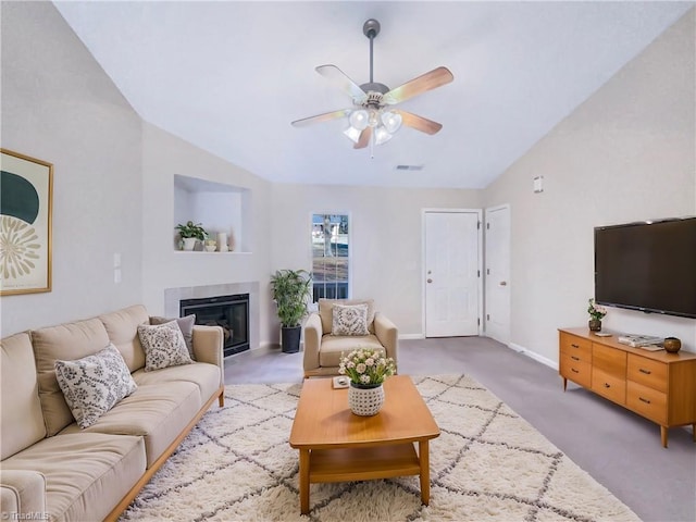 living room featuring light carpet, lofted ceiling, and ceiling fan