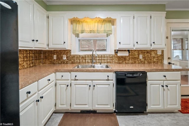 kitchen with tasteful backsplash, ornamental molding, white cabinetry, a sink, and black appliances