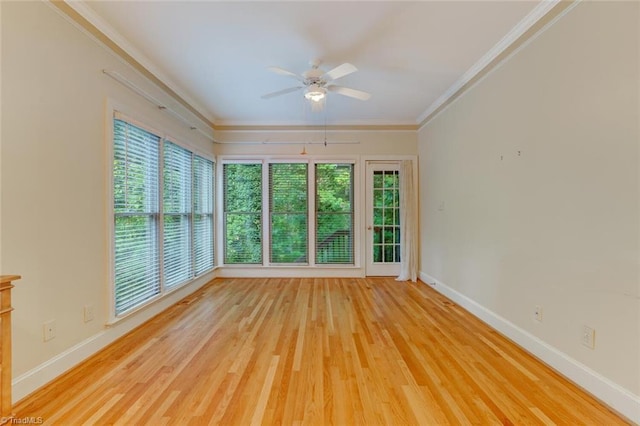 unfurnished sunroom with ceiling fan and a healthy amount of sunlight