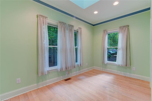 empty room with light wood-type flooring