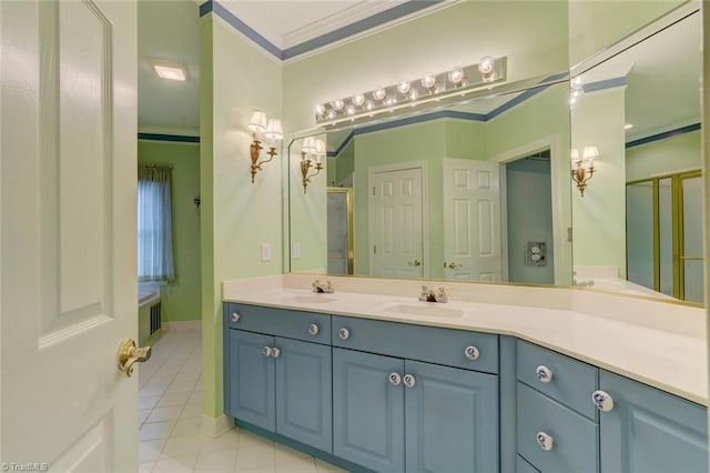 bathroom with vanity, tile patterned flooring, a shower with shower door, and crown molding