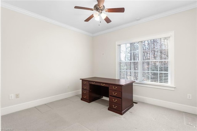 home office featuring baseboards, light carpet, a ceiling fan, and crown molding