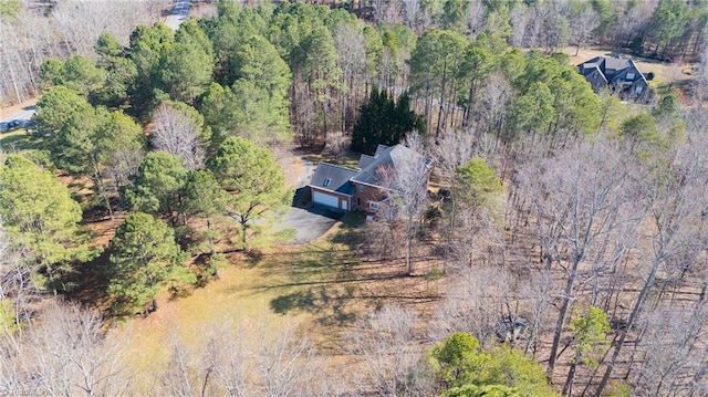 bird's eye view featuring a forest view