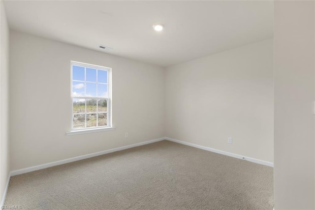 view of carpeted spare room