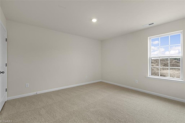 view of carpeted spare room