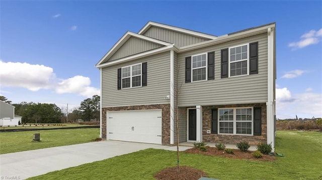 craftsman-style home with a garage and a front yard