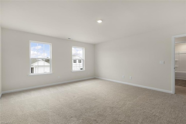 empty room featuring carpet floors