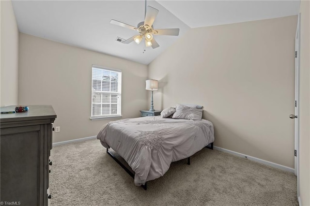 bedroom featuring light carpet, vaulted ceiling, visible vents, and baseboards