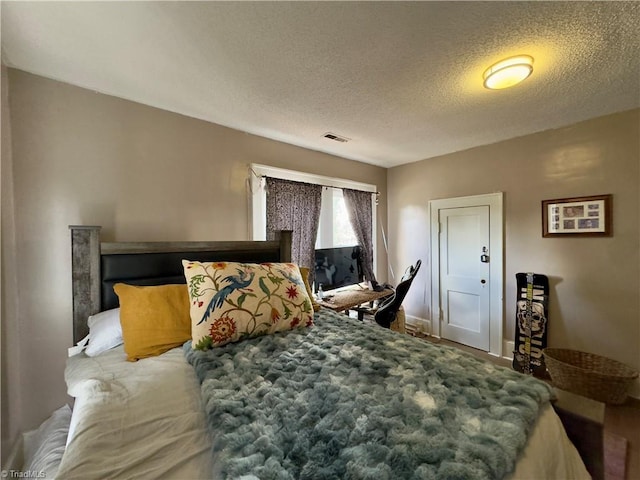 bedroom with a textured ceiling