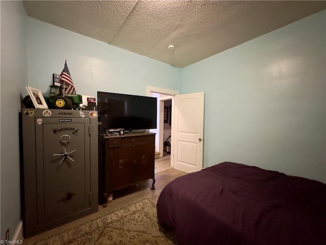 bedroom featuring a textured ceiling