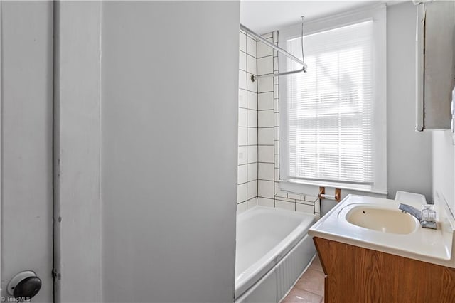 bathroom with a healthy amount of sunlight and vanity