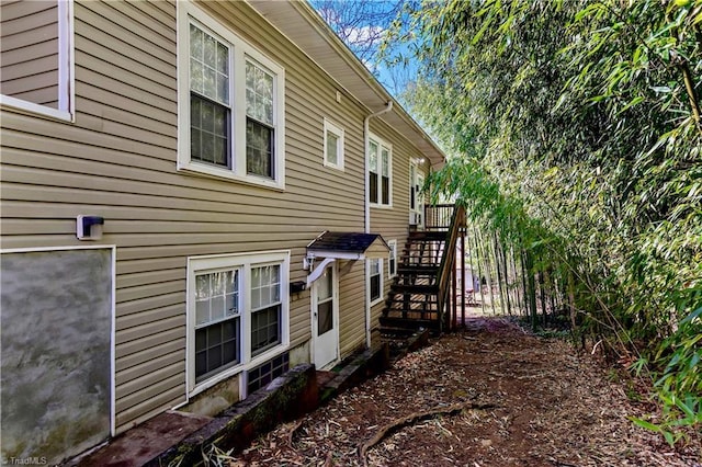 view of property exterior with stairs