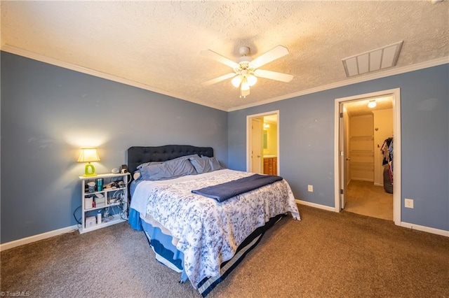 bedroom featuring ceiling fan, ensuite bathroom, carpet, ornamental molding, and a textured ceiling