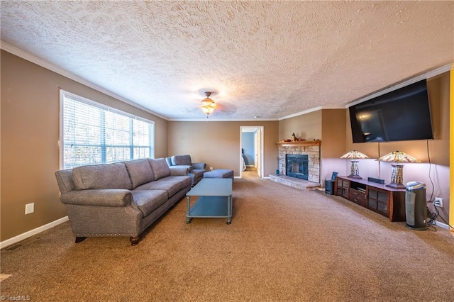 living room with a stone fireplace, a textured ceiling, ornamental molding, carpet flooring, and ceiling fan