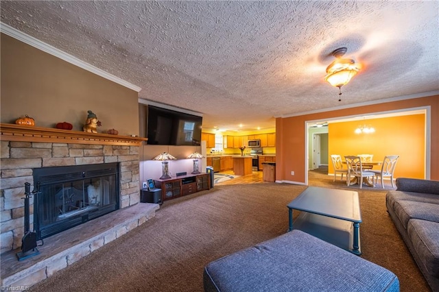 carpeted living room featuring crown molding, a textured ceiling, and a fireplace