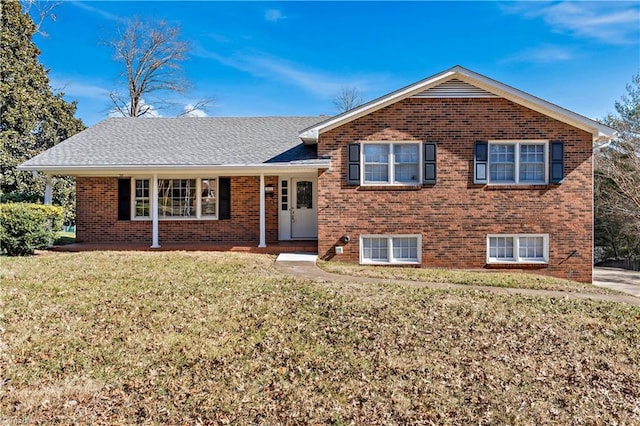 split level home featuring a front yard