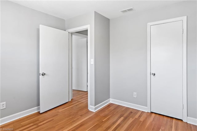 unfurnished bedroom featuring light hardwood / wood-style flooring