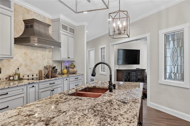 2643 NC Highway 801, Mocksville, NC 27028 - kitchen featuring custom exhaust hood, black electric stovetop, wood finished floors, ornamental molding, and light stone countertops