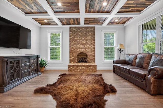 2643 NC Highway 801, Mocksville, NC 27028 - living area with coffered ceiling, recessed lighting, wood finished floors, a fireplace, and beam ceiling