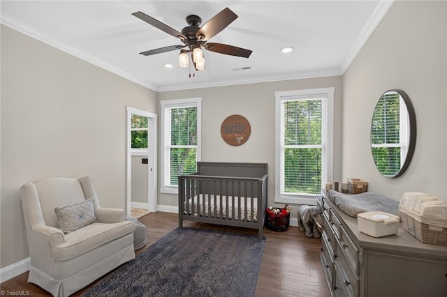 2643 NC Highway 801, Mocksville, NC 27028 - bedroom featuring wood finished floors, crown molding, recessed lighting, a ceiling fan, and a crib