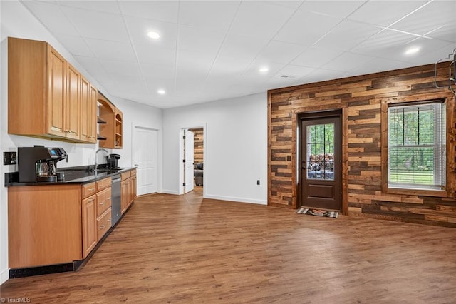 2643 NC Highway 801, Mocksville, NC 27028 - kitchen featuring dark countertops, wood finished floors, wooden walls, stainless steel dishwasher, and open shelves