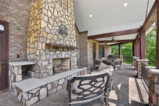 2643 NC Highway 801, Mocksville, NC 27028 - view of patio with an outdoor living space with a fireplace and a ceiling fan