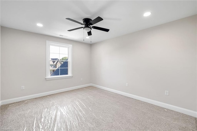 carpeted empty room with recessed lighting, visible vents, a ceiling fan, and baseboards