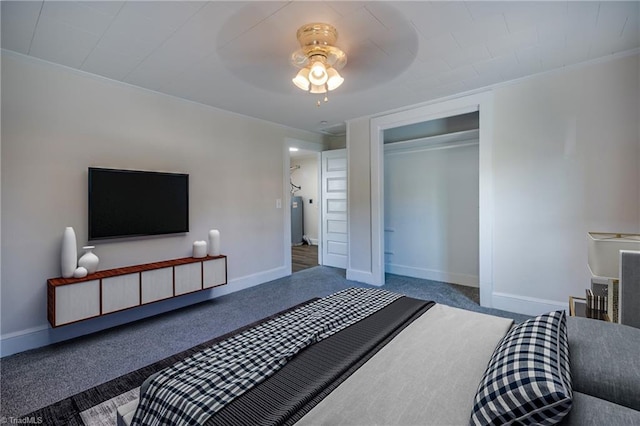 bedroom with carpet flooring, ceiling fan, and a closet