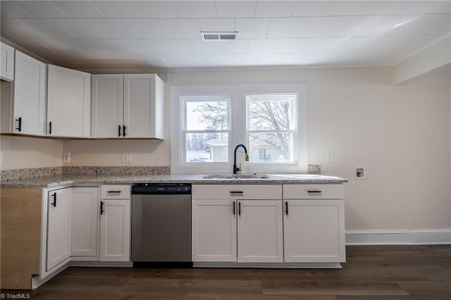 kitchen featuring dark wood-type flooring, sink, dishwasher, light stone countertops, and white cabinets