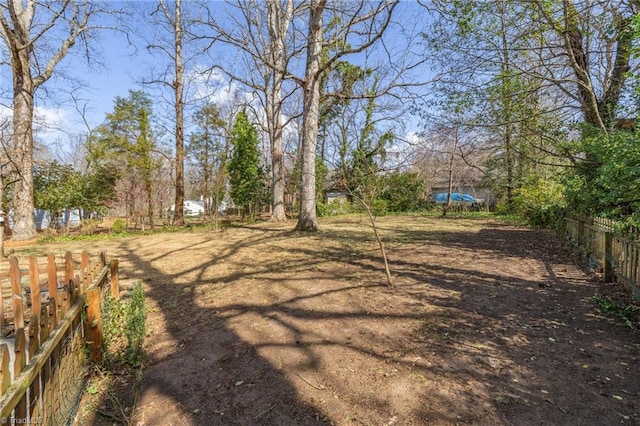 view of yard with fence