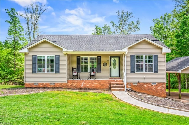 ranch-style home featuring a carport, a shingled roof, crawl space, a porch, and a front lawn