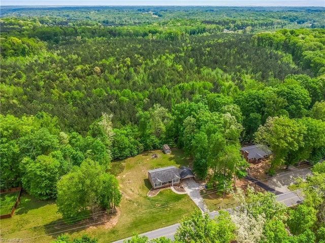 bird's eye view featuring a view of trees