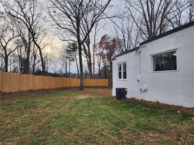 view of yard with central AC