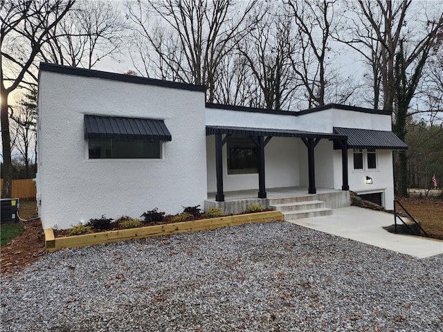 contemporary home featuring a porch