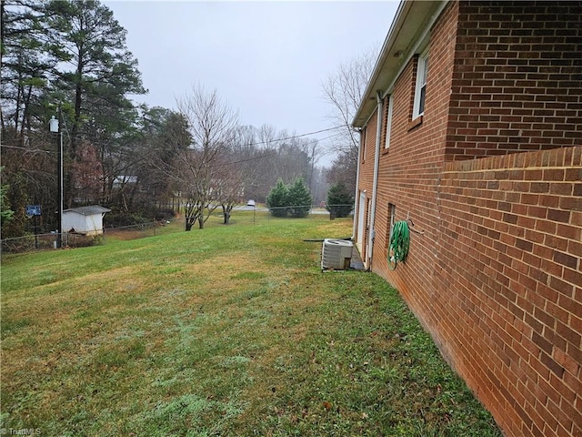 view of yard featuring central AC