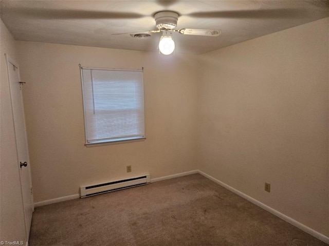 carpeted empty room with a baseboard heating unit and ceiling fan