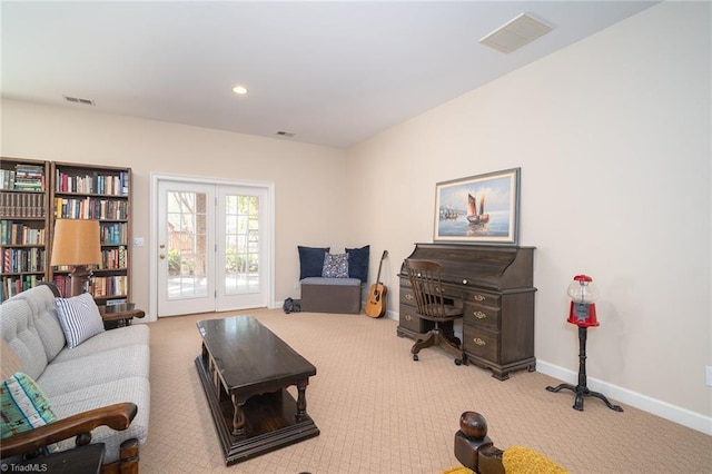 3913 Katie Dr, Greensboro, NC 27410 - carpeted living room featuring baseboards, visible vents, and recessed lighting