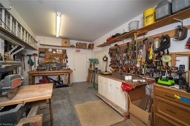 3913 Katie Dr, Greensboro, NC 27410 - interior space with concrete flooring and a workshop area