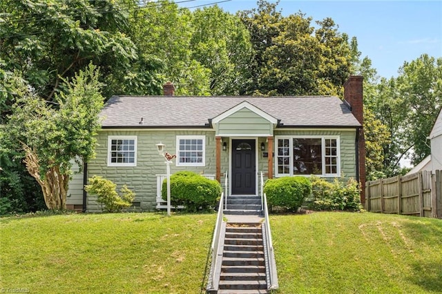 506 W 26th St, Winston-Salem, NC 27105 - view of front facade featuring a chimney and crawl space